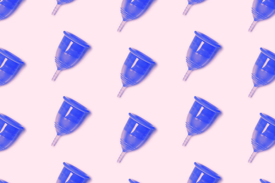 Are menstrual cups worth it? Nearly a year after swapping to a menstrual cup, our writer swears by hers for reducing period cramps and feeling more in touch with her body. Keep scrolling for her <a href="https://fave.co/3axvvKd" target="_blank" rel="noopener noreferrer">Saalt menstrual cup</a> review. (Photo: Elena Feodrina via Getty Images)