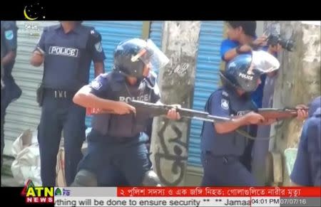 Police gather after militants attacked Bangladeshi police guarding an Eid festival in Kishoreganj town in this still frame taken from video July 7, 2016. Courtesy of ATN News /via REUTERS TV