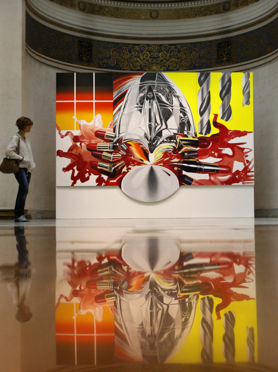 FILE - In this Monday, July 23, 2007 file photo, a visitor stands next to James Rosenquist's "The Swimmer in the Econo-mist" on display at the exhibition "Art in America: Three Hundreds Years of Innovation" which opened in the Pushkin Fine Arts Museum in Moscow. Rosenquist, a key figure in the pop art movement, has died. He was 83. Rosenquist's wife, Mimi Thompson, told The New York Times that he died Friday, March 31, 2017 in New York City after a long illness. (AP Photo/Misha Japaridze)