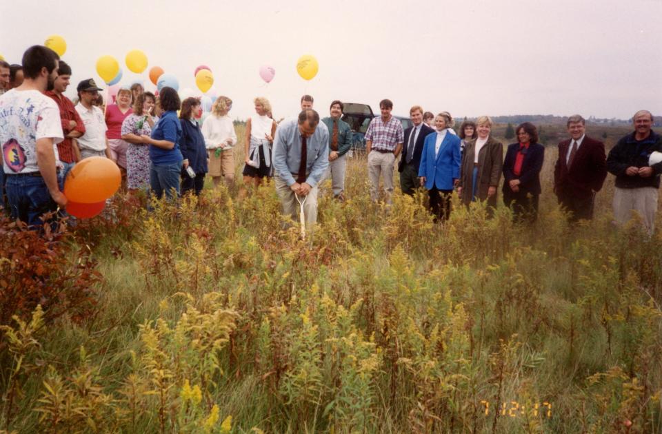In 1993, the staff of Mitchell Graphics broke ground on a new construction site to accommodate the growing business.