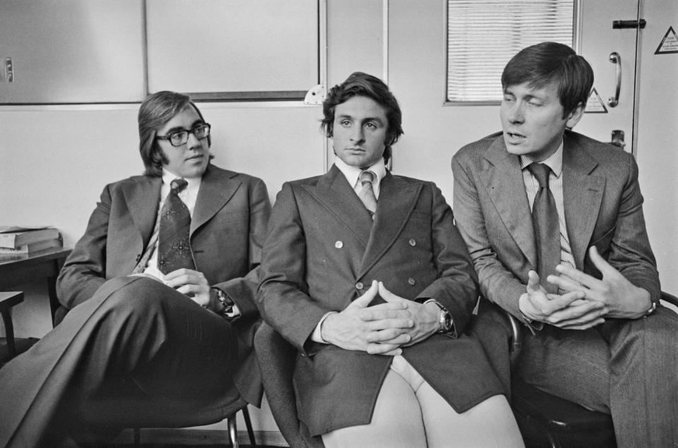 Nando Parrado (left) and Roberto Canessa (centre), former members of the Uruguayan rugby team who survived an air crash in the Andes on Uruguayan Air Force Flight 571, attend a press conference after their experiences were documented in the book 'Alive: The Story of the Andes Survivors' by Piers Paul Read (right), UK, 6th May 1974.