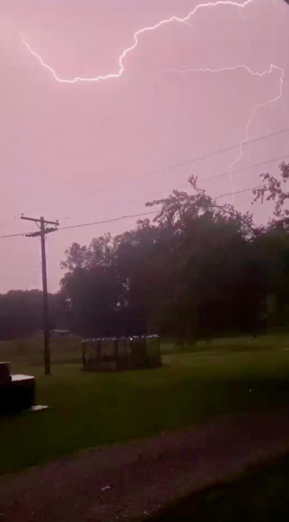 Ridin' the storm out. Streaks of lightning crack the sky during a storm in Carleton. Provided by Gabby Williams