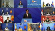 This image taken from video provided by VTV shows ASEAN foreign ministers watching Vietnamese Foreign Minister Pham Binh Minh, center, delivering a speech in Hanoi, Vietnam, during the opening of ASEAN Foreign Ministers' Meeting on Wednesday, Sept. 9, 2020. Southeast Asia's top diplomats are holding their annual talks by video Wednesday to discuss the immense crisis wrought by the coronavirus pandemic and rising tensions in the South China Sea amid the escalating rivalry between Washington and Beijing. (VTV via AP)