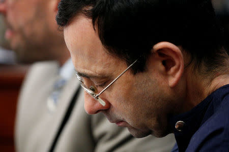 Larry Nassar, a former team USA Gymnastics doctor who pleaded guilty in November 2017 to sexual assault charges, sits in the courtroom during his sentencing hearing in Lansing, Michigan, U.S., January 22, 2018. REUTERS/Brendan McDermid