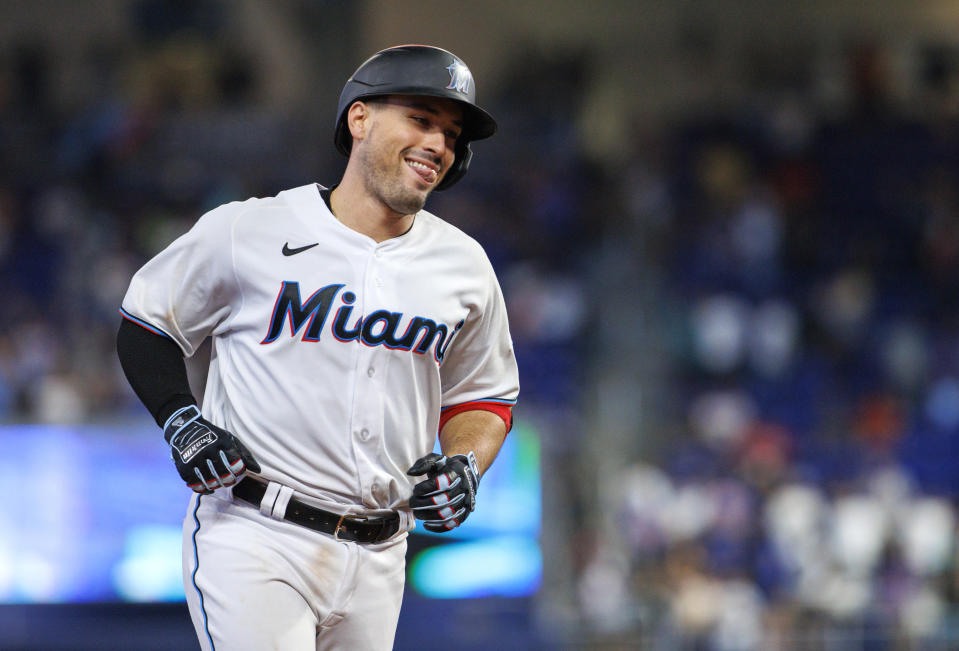 Miami Marlins' Nick Fortes smiles as he rounds the bases after hitting a walkoff solo home run during the ninth inning of a baseball game against the New York Mets, Sunday, June 26, 2022, in Miami. (David Santiago/Miami Herald via AP)