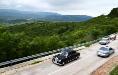 Oldtimer Mercedes cars are seen driving in Imotski, Croatia, May 19, 2019. REUTERS/Antonio Bronic