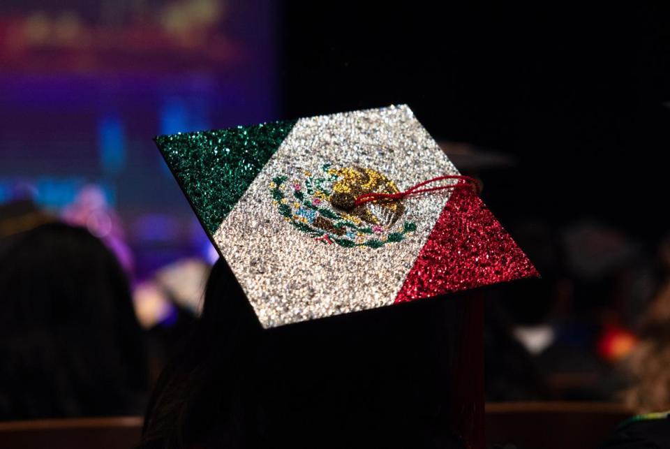 A decorated cap of the Mexico flag done in rhinestones sits on top of a graduates head during the University of Texas at Austin Latinx Graduation Latinx Graduation On Thursday, May 9, 2024 in Austin.