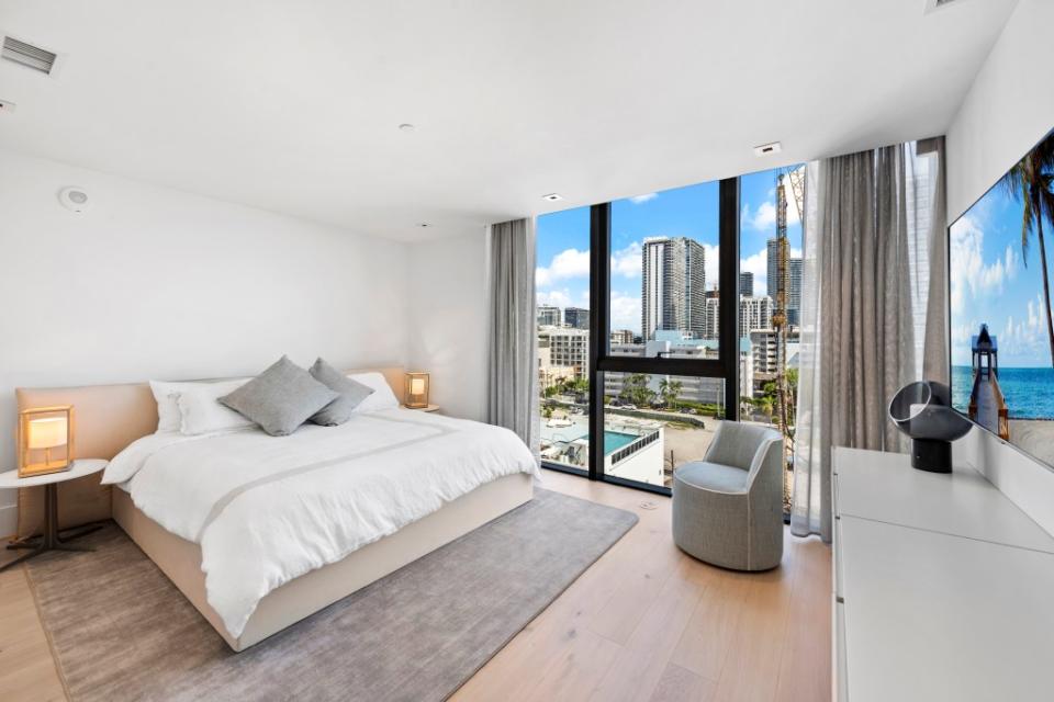 One of the bedrooms — this one looks out to city views. Legendary Productions