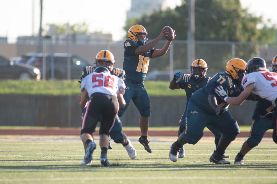 Battle Creek Central junior Devoine Newton catches the ball against Byron Center at C.W. Post Field on Friday, Aug. 26, 2022.