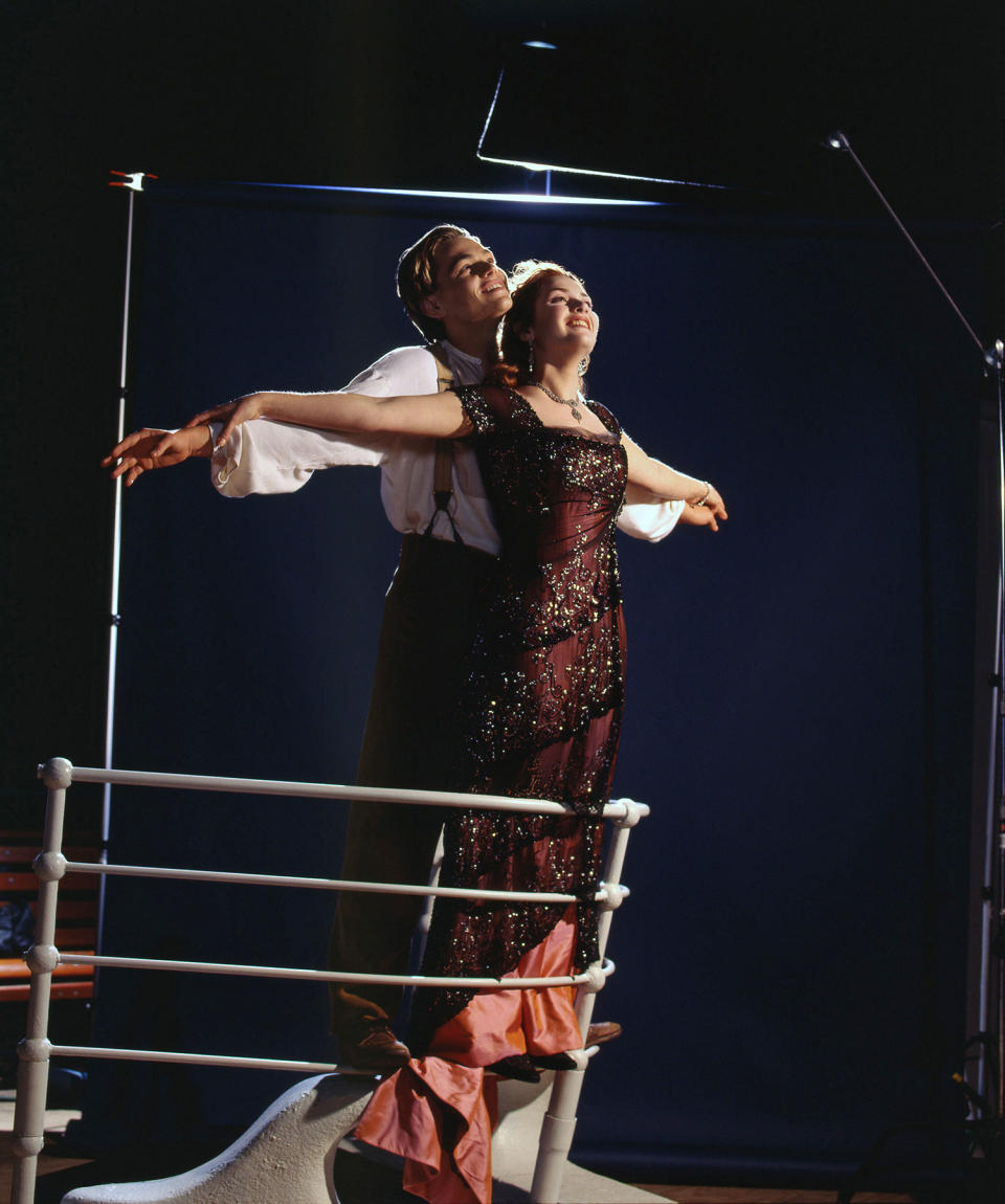 DiCaprio and Winslet with their arms outstretched on the edge of the ship during the famous "I'm flying" scene