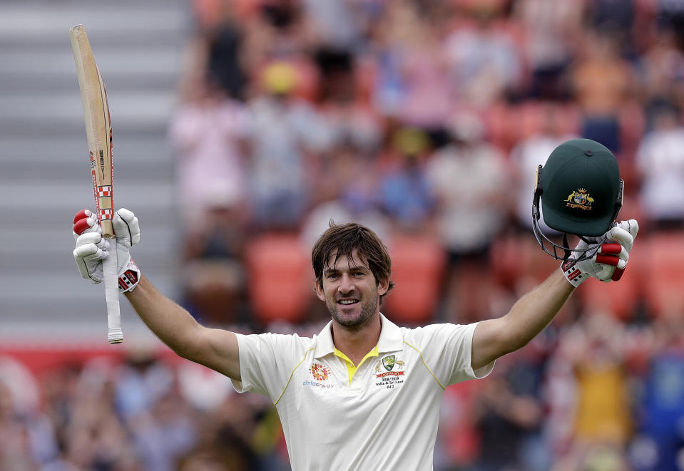 FILE - In this Feb. 1, 2019, file photo, Australia's Joe Burns celebrates making 100 runs against Sri Lanka during their cricket test match in Canberra. Consecutive double centuries have earned Will Pucovski a spot in an expanded Australian test squad that also includes struggling incumbent opener Burns for the four-test series against India. (AP Photo/Rick Rycroft, File)