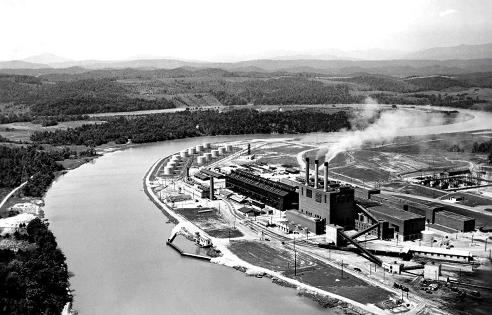 The former K-770 Powerhouse provided energy for enrichment operations at the Oak Ridge Gaseous Diffusion Plant. The powerhouse and oil tank farm are pictured during early operations. The U.S. Department of Energy's Office of Environmental Management demolished the facilities in the 1990s. Now the land where they stood is being transferred for future industry.