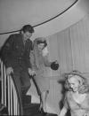 <p>After hosting a large reception in her Hollywood home, Shirley Temple traded her long-sleeve satin wedding gown for a grey belted suit, as she and her new husband, Army Sargent John Agar, departed for their honeymoon. The couple was all smiles as their friends and family sent them off as newlyweds. <br></p>