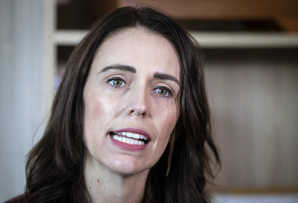 New Zealand Prime Minister Jacinda Ardern speaks to media at her electorate office in Aukland, New Zealand Wednesday, April 24, 2019. Ardern said that she and French President Emmanuel Macron will host a meeting in Paris next month seeking to eliminate acts of violent extremism and terrorism from being shown online. (Jason Oxenham/New Zealand Herald via AP)