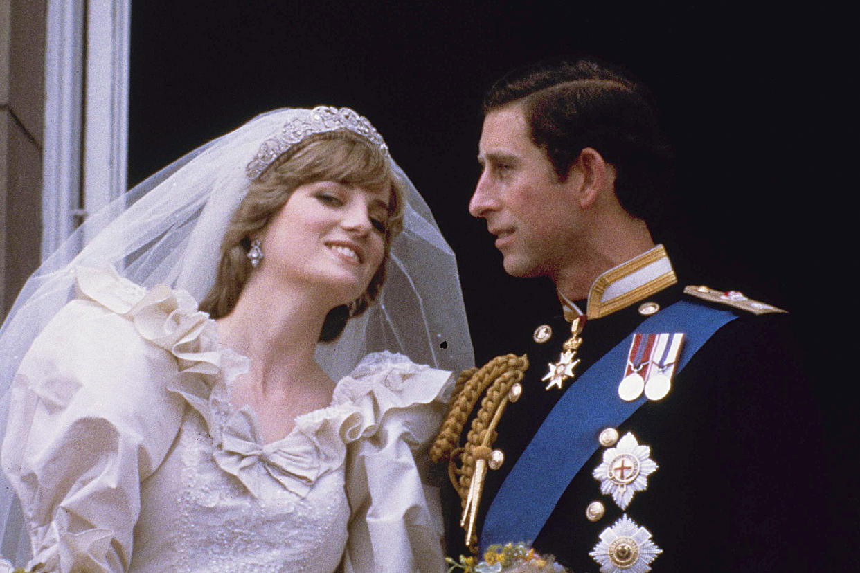 Britain's Prince Charles and his bride Diana, Princess of Wales, are shown on their wedding day on the balcony of Buckingham Palace in London, July 29, 1981. (AP)