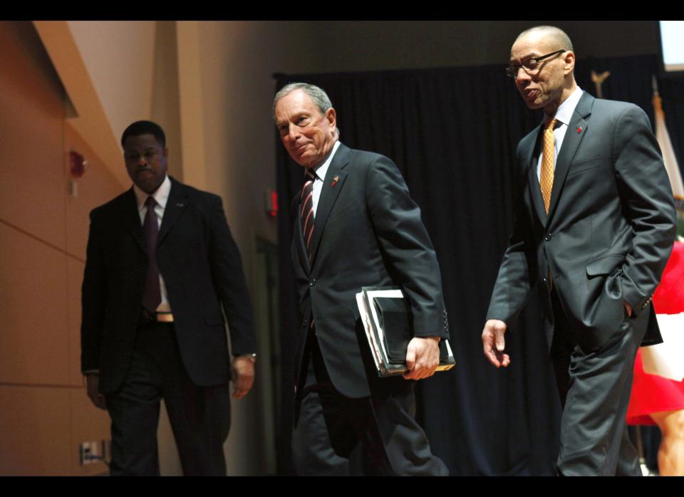 New York City Mayor Michael Bloomberg, center, and New York City Department of Education Chancellor Dennis Walcott, right, leave a forum on education at American University in Washington, Friday, March 2, 2012. (AP Photo/Jacquelyn Martin)