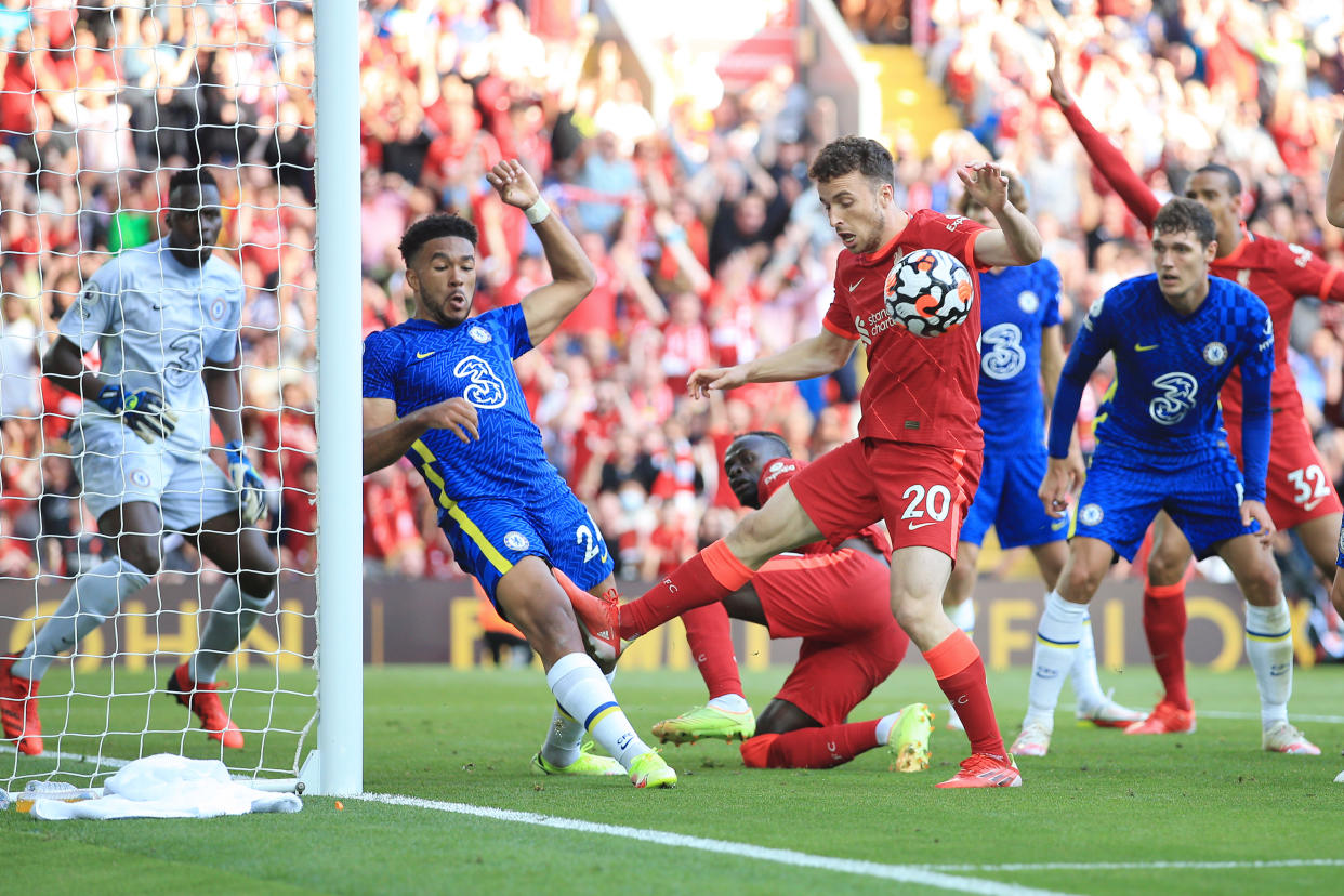 Diogo Jota of Liverpool battles with Reece James of Chelsea on the Chelsea before James was red-carded.