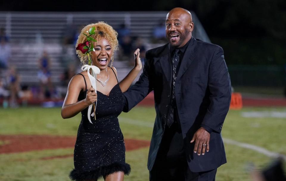 PHOTO: Amber Wilsondebriano and her dad Chevalo Wilsondebriano as Amber is announced homecoming queen. (Monique Wilsondebriano)