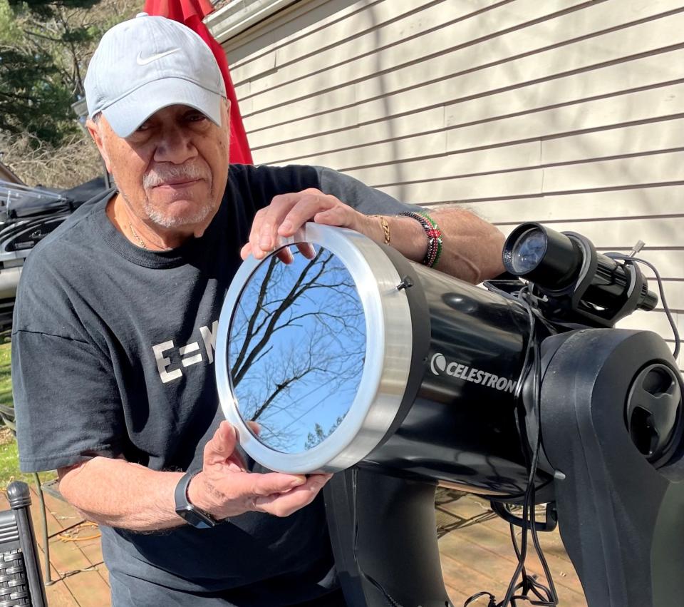 Gary Swangin, preparing his telescope for the total eclipse