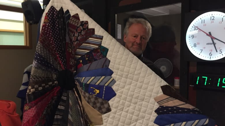 Formal wear gets cozy as retired ties transformed into quilt