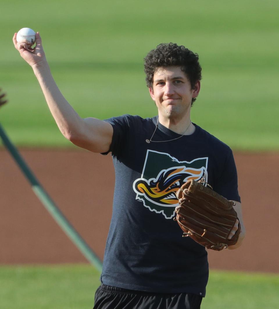 "Jeopardy!" champion Matt Amodio of Medina throws out the first pitch before the Akron RubberDucks game Aug. 4, 2021, at Canal Park.