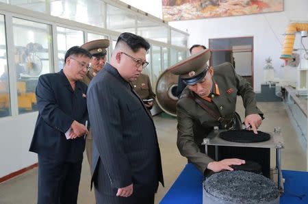 North Korean leader Kim Jong-Un looks on during a visit to the Chemical Material Institute of the Academy of Defense Science in this undated photo released by North Korea's Korean Central News Agency (KCNA) in Pyongyang on August 23, 2017. KCNA/via REUTERS