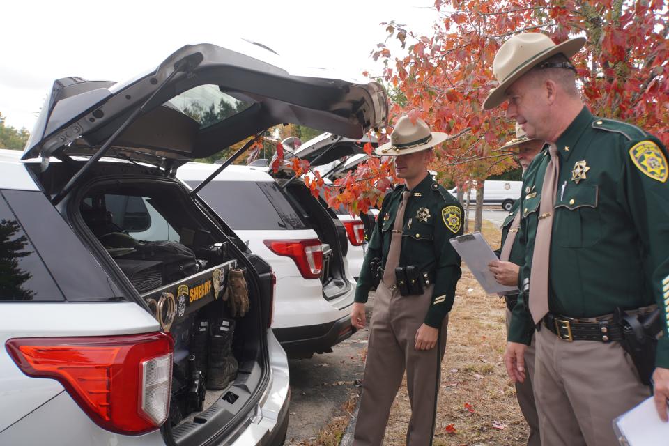 York County Chief Deputy Jeremy Forbes inspects equipment in the truck of Deputy Cody Frasier’s cruiser during the agency’s annual inspection Tuesday, Oct. 17.