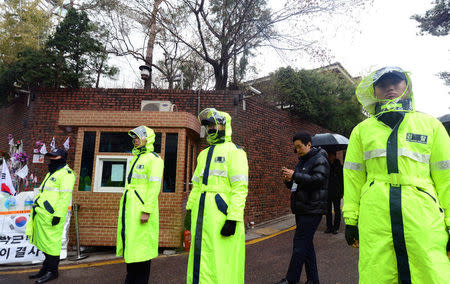 Policemen stand guard outside the house of South Korea's ousted leader Park Geun-hye in Seoul. Choi Hyun-kyu/News1 via REUTERS