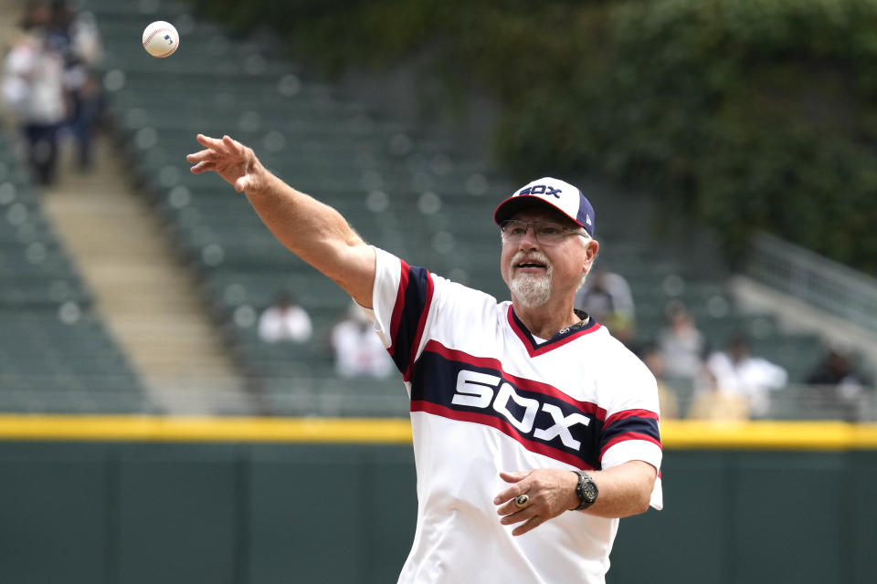 Former Chicago White Sox player Ron Kittle throws out a ceremonial first pitch before a baseball game between the Minnesota Twins and the Chicago White Sox in Chicago, Sunday, Sept. 17, 2023. (AP Photo/Nam Y. Huh)