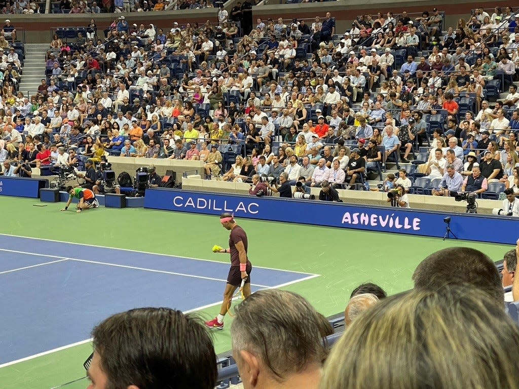 The Buncombe County Tourism Development Authority paid $1.3 million for advertising and promotional consideration at the 2022 U.S. Open tennis tournament. The package included court-side signage seen here during a match featuring Spanish tennis star Rafael Nadal.