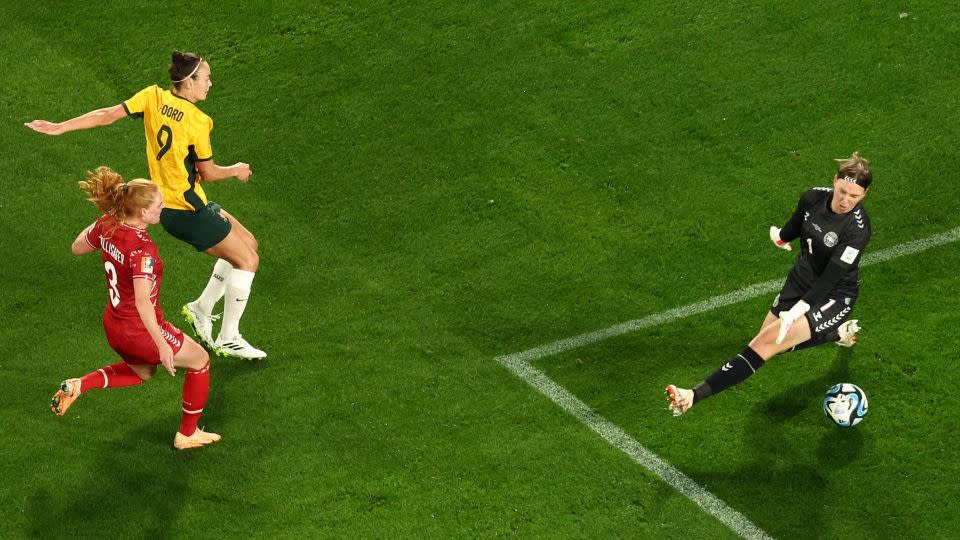 Foord scores Australia's opening goal against Denmark. - David Gray/AFP/Getty Images