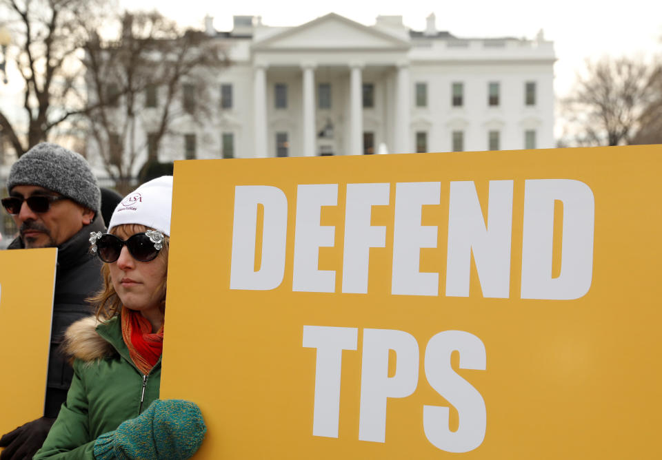 Demonstrators&nbsp;rally&nbsp;outside the White House on Jan. 8 to protest the termination of temporary protected status for Salvadorans. The majority of Americans oppose Trump's immigration policies, according to a new poll. (Photo: Kevin Lamarque / Reuters)