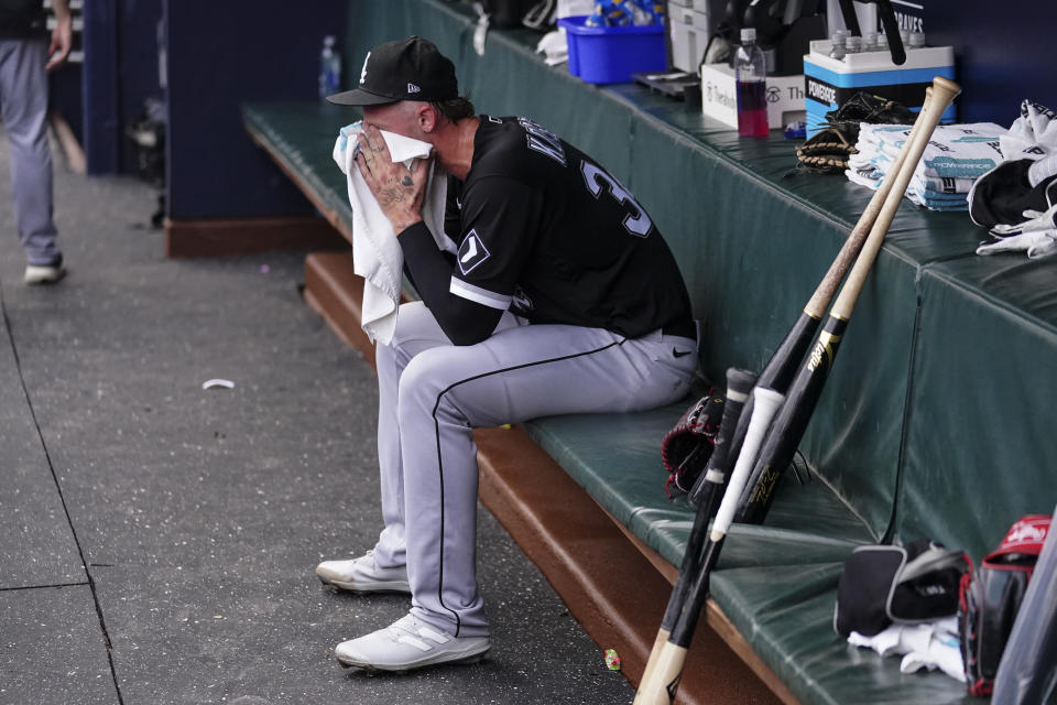 Chicago White Sox starting pitcher Michael Kopech sits on the bench after being relieved in the first inning of a baseball game against the Atlanta Braves, Friday, July 14, 2023, in Atlanta. (AP Photo/John Bazemore)