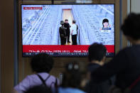 A TV screen shows an image of North Korean leader Kim Jong Un during a news program at the Seoul Railway Station in Seoul, South Korea, Friday, Sept. 13, 2024. The letters read "North Korea, unveiling the uranium enrichment facility for the first time." (AP Photo/Lee Jin-man)