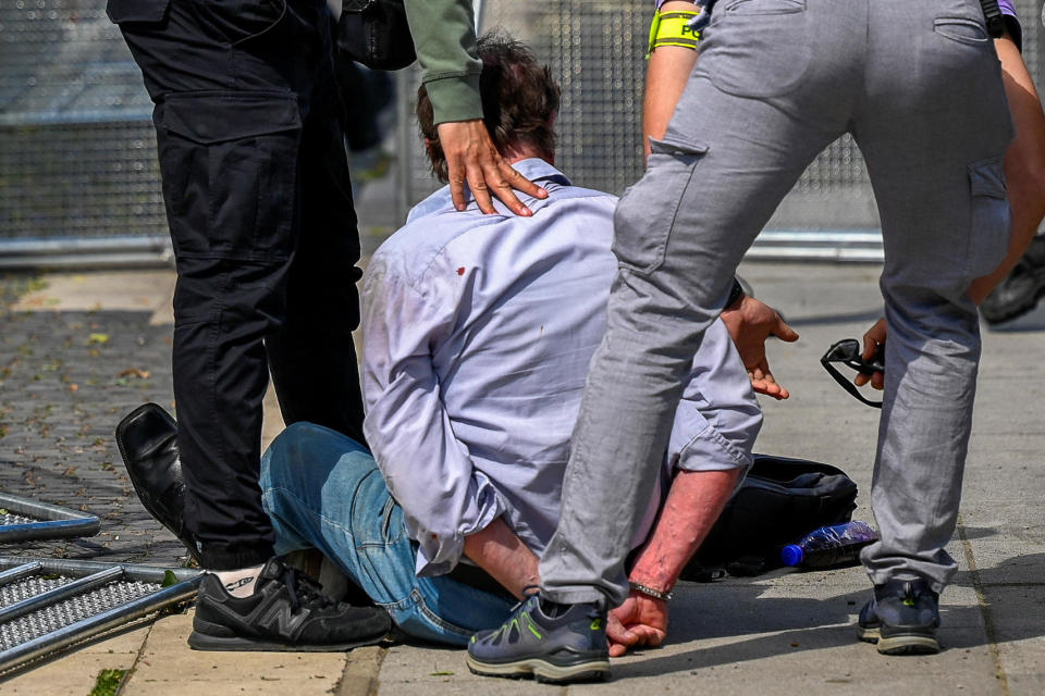 A person is detained after a shooting incident in which Slovak Prime Minister Robert Fico was injured after a meeting in Handlova, Slovakia, May 15, 2024. / Credit: Radovan Stoklasa/REUTERS