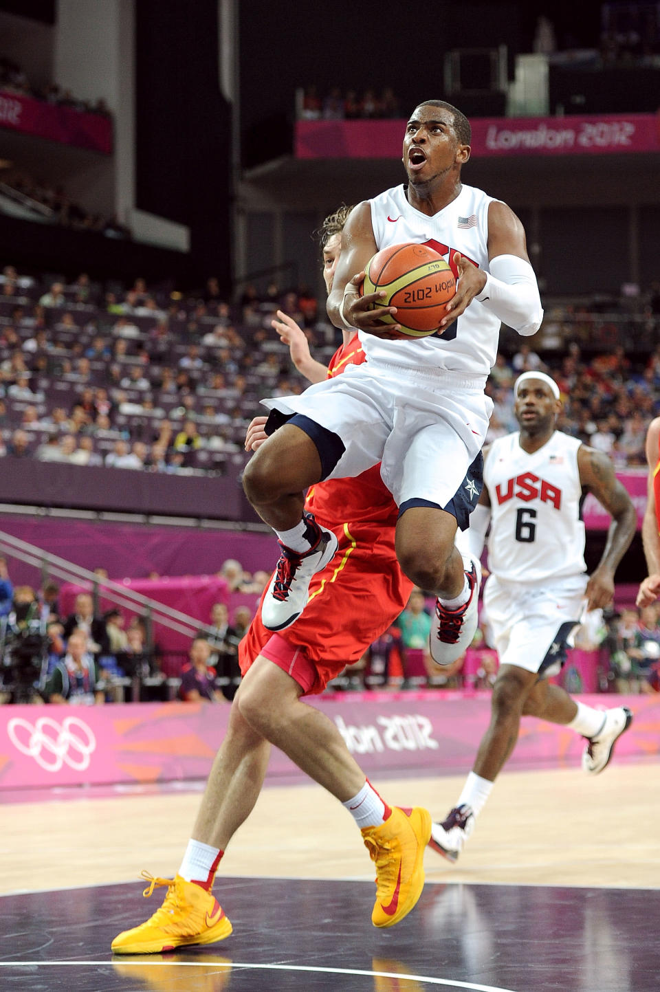 LONDON, ENGLAND - AUGUST 12: Chris Paul #13 of the United States takes the ball to the basket during the Men's Basketball gold medal game between the United States and Spain on Day 16 of the London 2012 Olympics Games at North Greenwich Arena on August 12, 2012 in London, England. (Photo by Harry How/Getty Images)