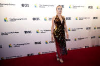 Actress Scarlett Johansson poses on the red carpet at the honors gala for the 44th Kennedy Center Honors on Sunday, Dec. 5, 2021, in Washington. (AP Photo/Kevin Wolf)