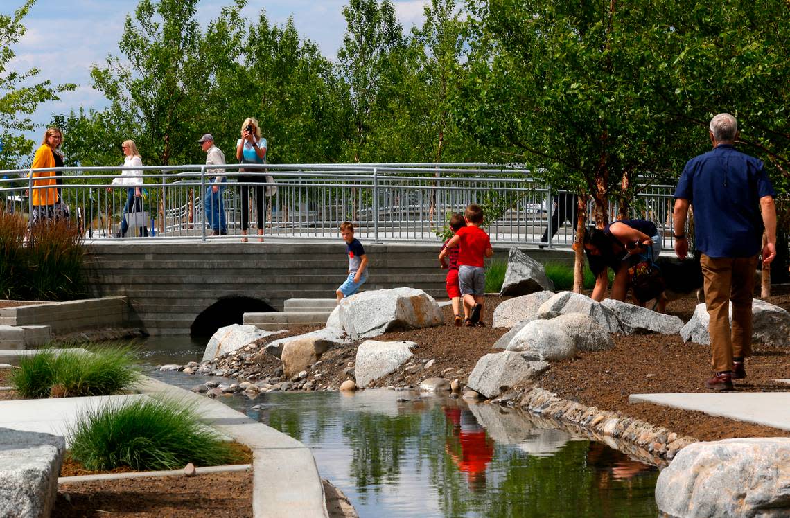 People attending the grand opening event in June 2022 for the Vista Field phase one site improvements check out the water features at the centerpiece of the first 20 acres.