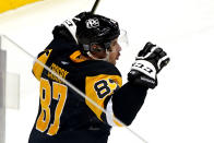 Pittsburgh Penguins' Sidney Crosby celebrates his overtime goal in the team's NHL hockey game against the Washington Capitals in Pittsburgh, Tuesday, Jan. 19, 2021. The Penguins won 5-4. (AP Photo/Gene J. Puskar)