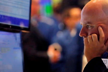 A trader works on the floor at the New York Stock Exchange (NYSE) in New York City, New York, U.S., July 1, 2016. REUTERS/Andrew Kelly