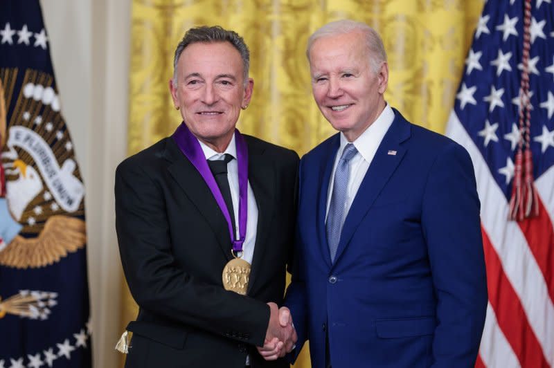 Bruce Springsteen (L) and President Joe Biden attend the Arts and Humanities Award ceremony in March. File Photo by Oliver Contreras/UPI