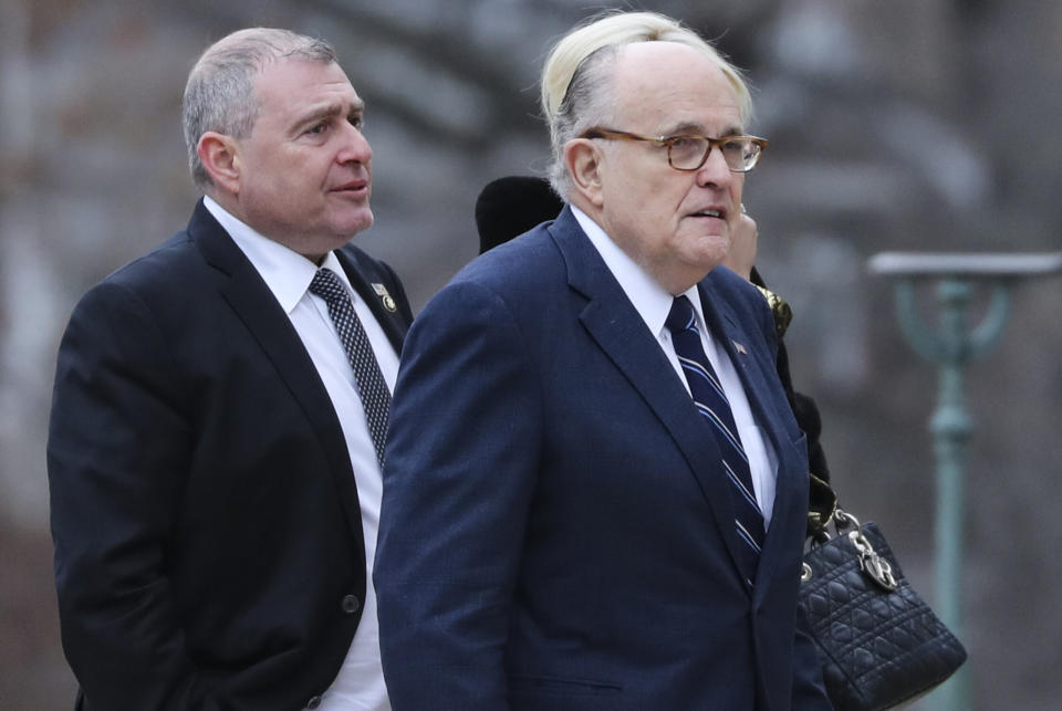 Rudy Giuliani and Lev Parnas, the Soviet-born businessman who served as Giuliani's fixer in Ukraine, arrive for the funeral of President George H.W. Bush at the National Cathedral in Washington, D.C., Dec. 5, 2018. (Photo: ALEX EDELMAN via Getty Images)