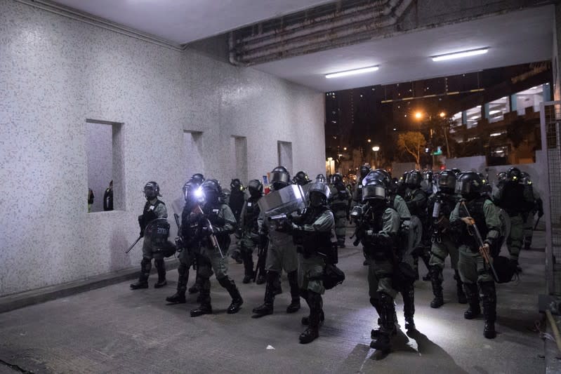 Police retreat from a housing estate in Tseung Kwan O in Hong Kong