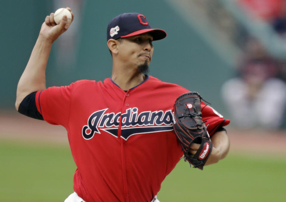 FILE - In this May 20, 2019, file photo, Cleveland Indians starting pitcher Carlos Carrasco delivers in the first inning of a baseball game against the Oakland Athletics, in Cleveland. Carrasco has been diagnosed with a blood disorder. The team said Wednesday, June 5, 2019, that Carrasco had been feeling lethargic for several weeks. The Indians placed him on the 10-day injured list so the right-hander can “explore the optimal treatment and recovery options.”(AP Photo/Tony Dejak, File)