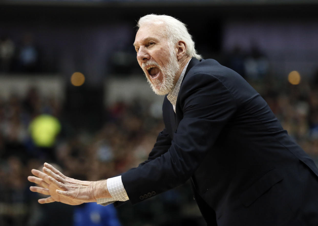 San Antonio Spurs head coach Gregg Popovich shouts in the direction of an official in the second half of an NBA basketball game against the Dallas Mavericks on Tuesday, Dec. 12, 2017, in Dallas. (AP Photo/Tony Gutierrez)