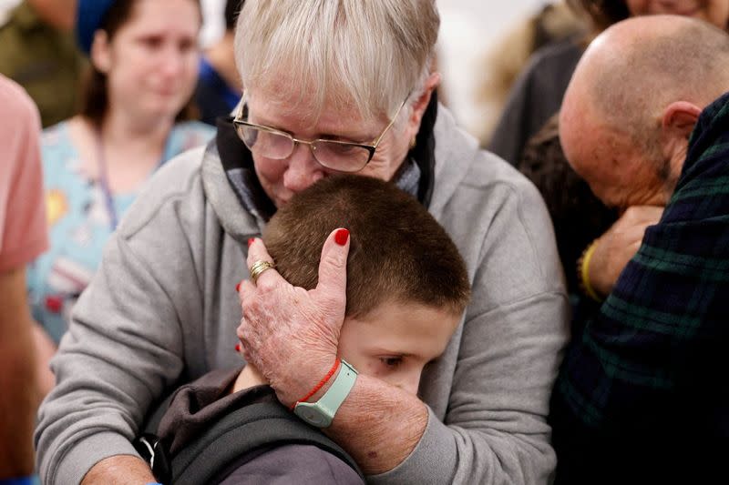 FILE PHOTO: Former hostages who were released from the Gaza Strip on November 26 are reunited with their family in Israel