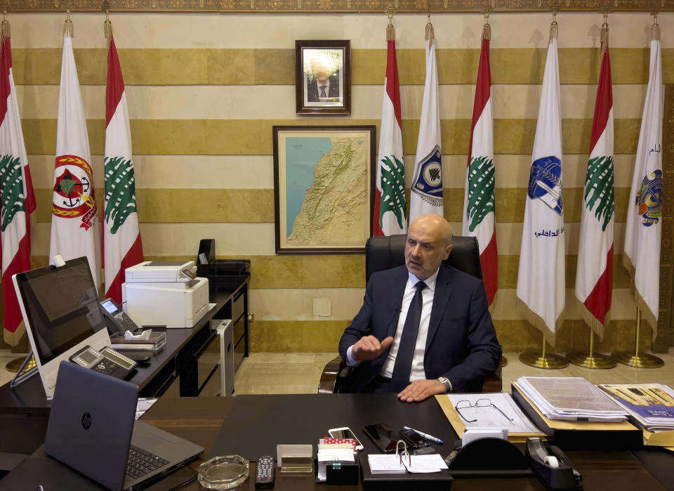 Lebanon's Interior Minister Bassam Moulawi, speaks during an interview with the Associated Press at his office, in Beirut, Lebanon, Tuesday, Nov. 23, 2021. Moulawi said on Tuesday every delay in resolving the crisis with Gulf nations threatens to affect the lives of more Lebanese already reeling from the impact of a massive economic crisis. (AP Photo/Hussein Malla)