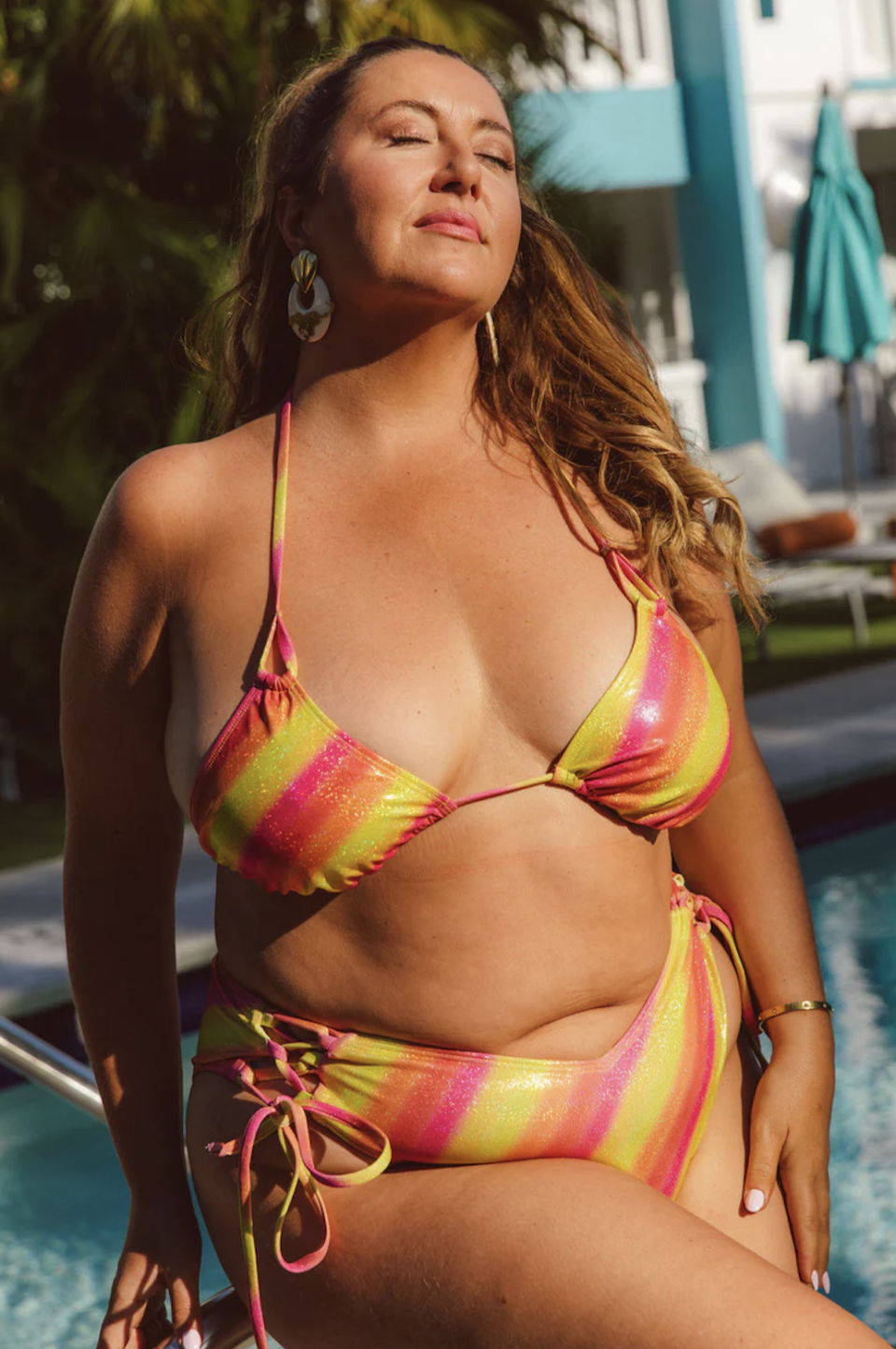 <p><a href="https://www.curvybeach.com/collections/shop-all-2022-new-4x-large/products/fruit-stripe-shimmer-side-tie-bottom" rel="nofollow noopener" target="_blank" data-ylk="slk:Shop Now;elm:context_link;itc:0;sec:content-canvas" class="link ">Shop Now</a></p><p>Fruit Stripe Shimmer</p><p>$71.00</p><p>Curvy Beach</p>