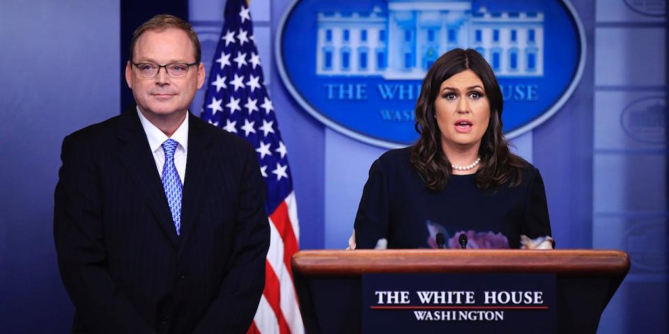 White House press secretary Sarah Huckabee Sanders, right, introduces Kevin Hassett, chair of the Council of Economic Advisers, to the media during a press briefing in the Brady press briefing room at the White House, in Washington, Friday, Nov. 17, 2017.