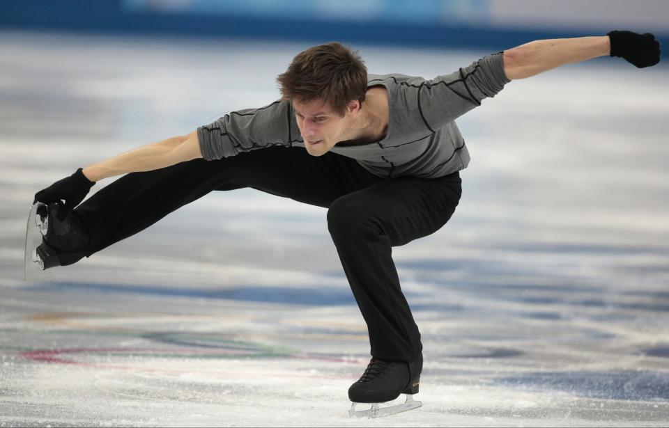 Viktor Pfeifer of Austria competes in the men's short program figure skating competition at the Iceberg Skating Palace during the 2014 Winter Olympics, Thursday, Feb. 13, 2014, in Sochi, Russia. (AP Photo/Ivan Sekretarev)